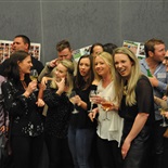 Group photo chaos.  Lucky Mark Dold is ready for the photo.