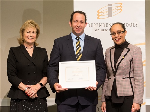 Outstanding teacher and coach receives honours award